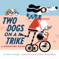 Two dogs on a trike